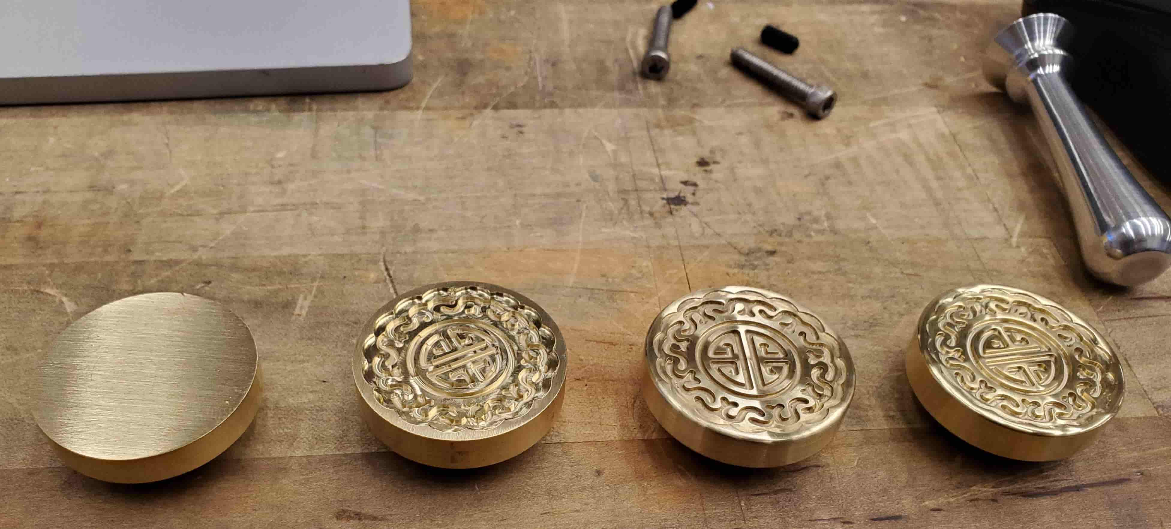 mooncake wax stamp heads at different stages of polishing